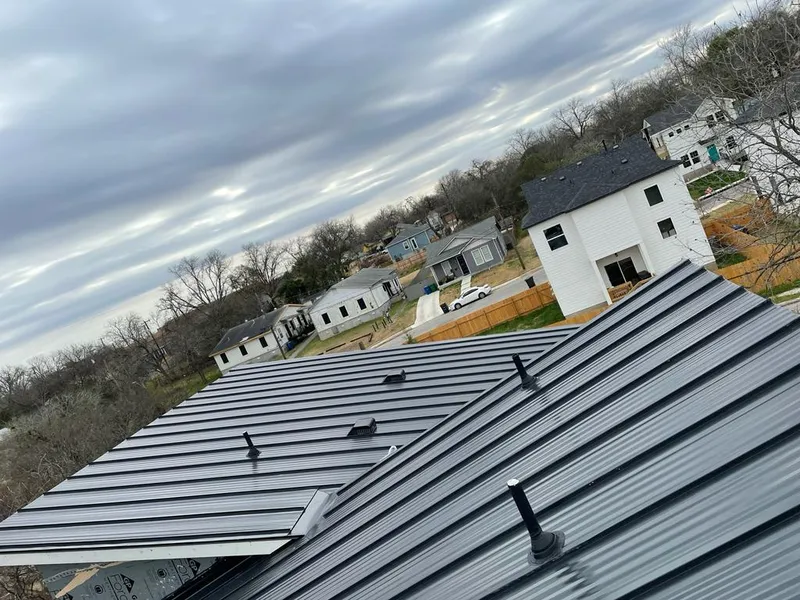 Standing seam metal roof panels with vents for Skylight Repair in Hollins